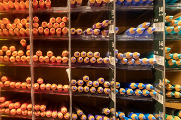 Rows of color pencil categorized in a shop
