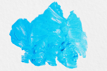 blue watercolor stain on white watercolor textured paper