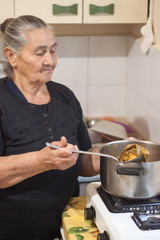 Elder woman cooking