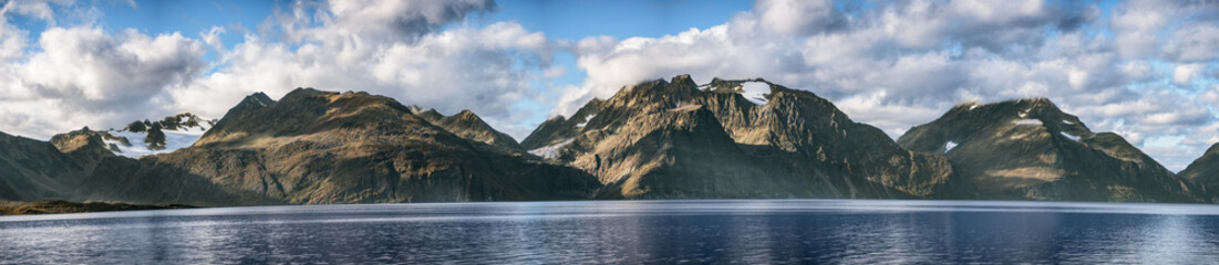 Obraz premium Wide range panorama view of Lyngen Alps near the Tromso with Strupbreen glacier - tourist attraction