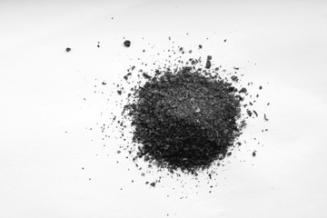 Mix of spices close-up on white in black and white.