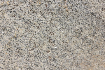 Granite background. Texture of gray granite stone. Natural pattern in gray tones. Abstract background
