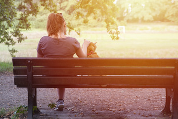 close up on lonely woman on the bench