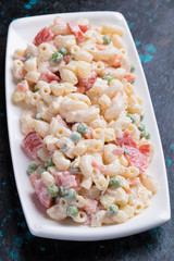 Homemade macaroni salad with vegetables