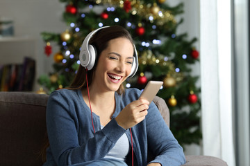 Woman listening to music on christmas