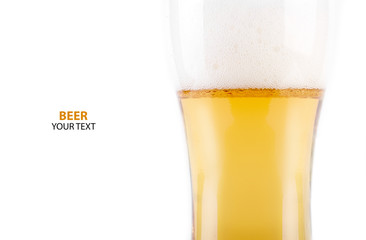 A glass of light beer on a white background. Alcoholic beverages