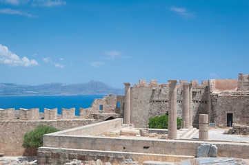 Obraz premium Lindos Acropolis. Ancient clifftop ruins. Remains of a Doric Temple of Athena Lindia, dating from about 300 BC. Greek Island of Rhodes, Rodos.