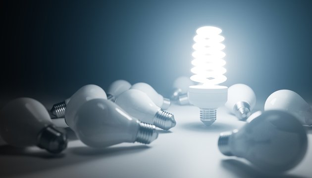 Fluorescent lamp shining and many old bulbs around. 3D rendered illustration.
