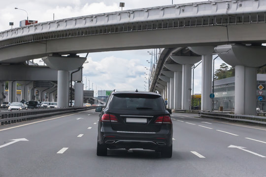 Off-road Car Moving On The Highway In The City Under The Overpass