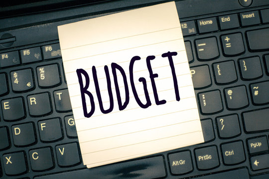 Writing note showing Budget. Business photo showcasing defined estimate of income and expenditure for set period of time.
