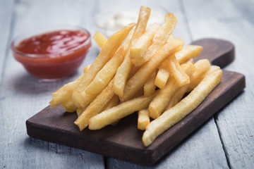 French fries with ketchup and mayonnaise