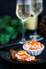 Salmon pate  with red caviar served with sliced bread