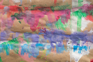 multicolored blots on recycled paper background