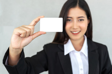 business woman  holding and showing empty business card or name card - business concept