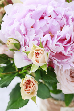 Bouquet with pink peonies and roses.