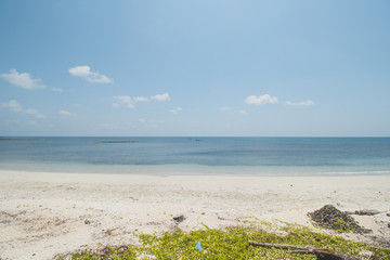 Clear Sea Water, White Sand, Cloudy Blue Sky and Tropical Beach