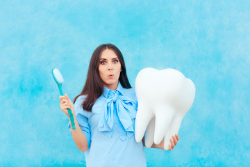 Funny Woman Holding Oversized Tooth in Dentist Concept Image