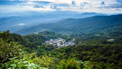 Top landscape View of mountain village on Doi Pui Mountains in sunset sky and clouds , Chiangmai , Thailand