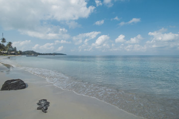 Clear Sea Water, White Sand, Cloudy Sky and Tropical Beach