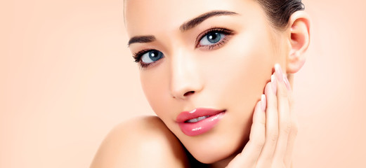 Fototapeta premium Pretty woman with clean and fresh skin. Beautiful girl portrait