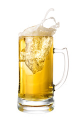 Cold beer splash out of mug isolated on white background.