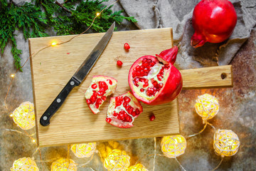 pomegranate red and bright, pieces and grain. Top view. food background