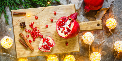 pomegranate red and bright, pieces and grain. Top view. food background