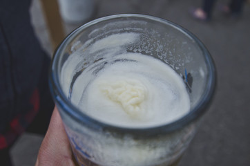 Looking down on the foam design in the beer glass at the oktoberfest. 