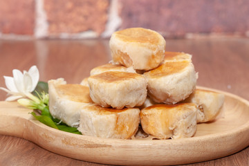 tao sor cake or moon cake in Phuket Thailand on wooden plate