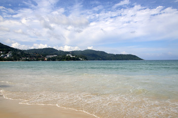 Fototapeta na wymiar Kata beach and the beautiful sky with white clouds, Phuket, Thailand