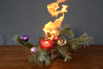 Dry Christmas decoration on fire.