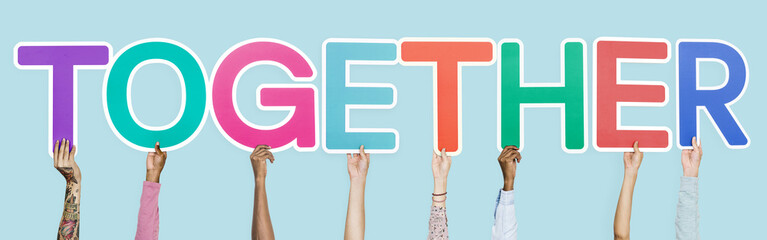 Hands holding the word together