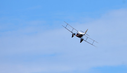 Fototapeta na wymiar Vintage De Havilland DH89A Dragon Rapide aircraft flying.