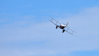 Vintage De Havilland  DH89A  Dragon Rapide aircraft  flying.