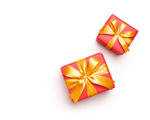 Red gift boxes with gold color bow