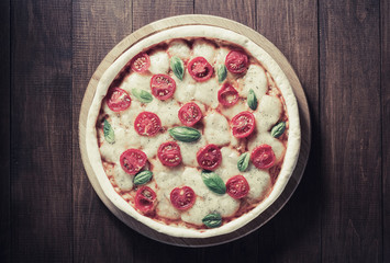 pizza at wooden table