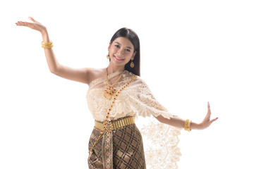 Cute girl in Thai national dress. Looks attractive and so elegant. Thai dress made from greatest Thai silk. Accessories made from gems stone, pearls and Gold. Her eyes looks charm like a spell.