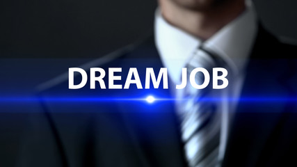Dream job, male in business suit standing in front of screen, career development