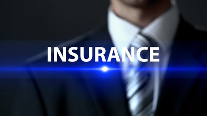 Insurance, male in suit standing in front of screen security, life protection