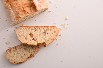 Whole loaf of bread on cutting board traditional vintage