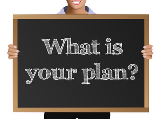 Girl (manager, student, businesswoman) in casual clothes holding a black chalk board with the text What is your plan