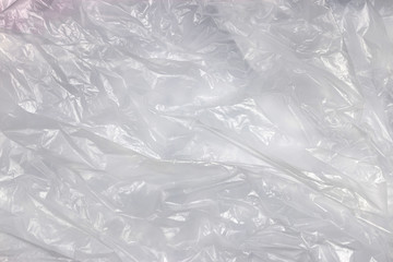 Obraz premium Plastic texture background. Abstract crumpled material. Transparent object wrinkled.