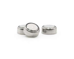 Button cell on isolated background. Small watch lithium battery ( Clipping path or cutout object for montage )
