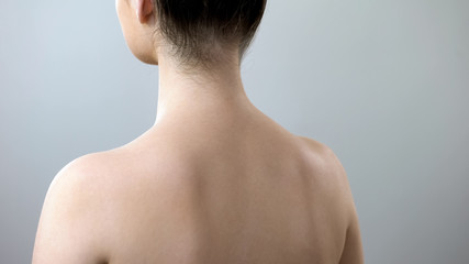 Healthy female neck and back, lady visiting spine doctor in clinic, healthcare