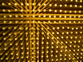 background of wooden narrow cylinders