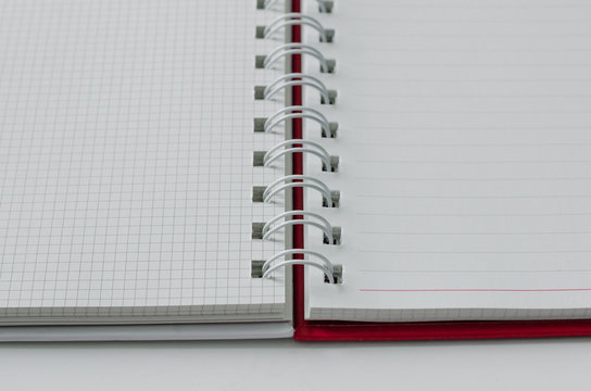 Wirebound Notebook Open with Lined and Grid Paper.