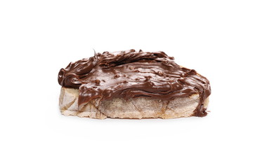 Cream chocolate with hazelnut chunks on slice of bread isolated on white background