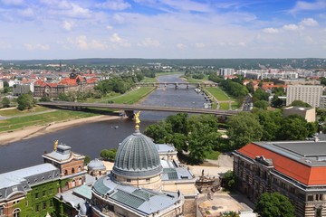 Obraz premium Dresden city, Germany. Elbe River with Carola Bridge (Carolabrucke).