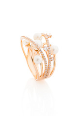 Pink gold ring with diamonds and pearls isolated on white