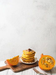 Stack of pancakes with pecan and syrup